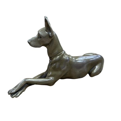 538 - Recumbent silver plated Great Dane, having glass inset eyes, heavily worn down to nickel base, L 30c... 