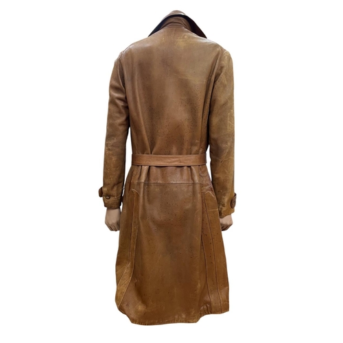 619 - Female mannequin atop wooden plinth base, holding vintage brown leather coat, H 125cm