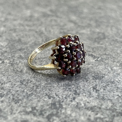 23 - Two 9ct garnet cluster rings, size M and K respectively, 5.7g