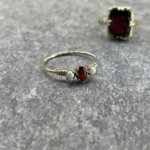 24 - 9ct garnet and seed pearl ring, size N/O, with a solitaire garnet ring, 2.5ct approx, size M, (stone... 