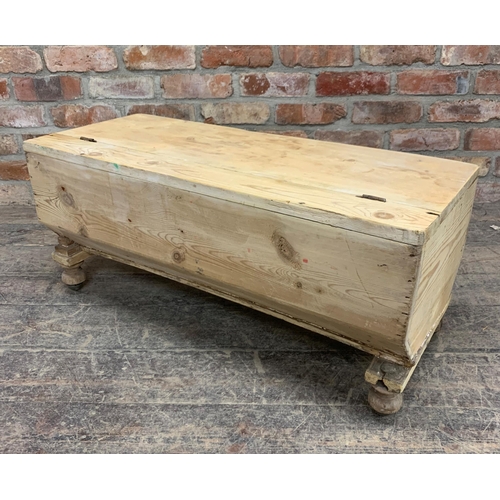 1183 - 19th Century rectangular pine dough bin, of casket form, with hinged lid, raised upon four turned fe... 