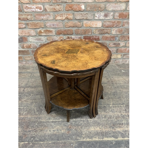 1189 - Art Deco nest of five tables of pie crust form, the large table housing four quarter tables beneath,... 