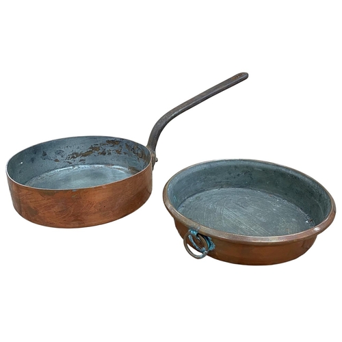 553 - Allez Freres large French copper saucepan, L 55cm x D 28cm, together with a further circular copper ... 