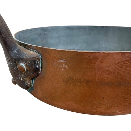 553 - Allez Freres large French copper saucepan, L 55cm x D 28cm, together with a further circular copper ... 