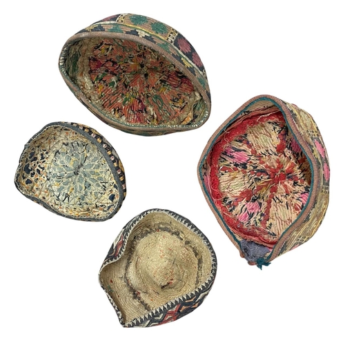 349 - Quantity of antique polychrome embroidered hats / skull caps, possibly Turkmen, largest approx 17cm ... 