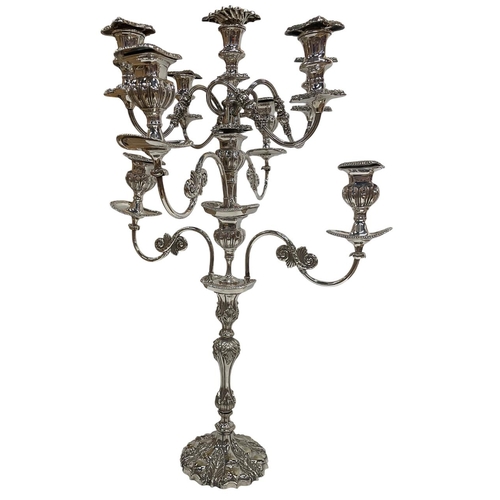 156 - Exceptional Frankensteined antique silver plated candelabra centre piece, having an assortment of mi... 