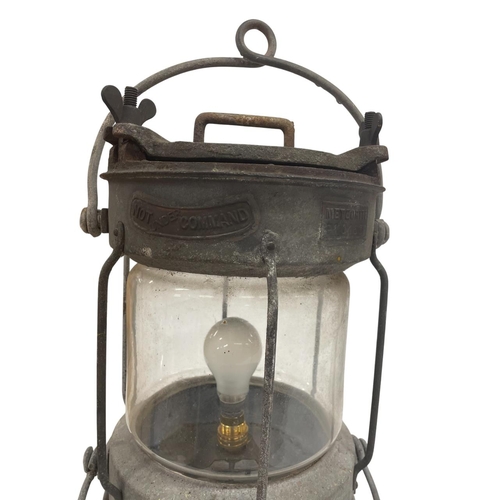 1111 - Meteorite ' Not Under Command ' ships lantern with swing handles, lamp body height approx 35cm