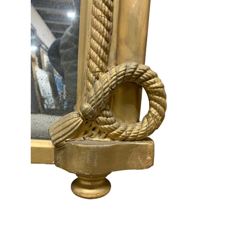 1154 - Good giltwood overmantle mirror, the arched frame with rope twist border mounted by an elaborate kno... 