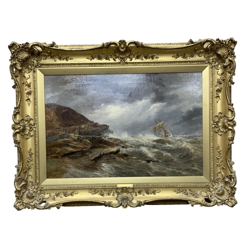 1587 - Thomas Bush Hardy (1842-1897) - 'A Wreck on Filey Brigg', signed and titled to lower left, oil on ca... 