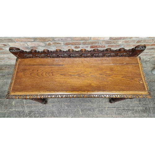 1254 - Victorian carved oak side table with raised back, H 100cm x W 118cm x D 38cm