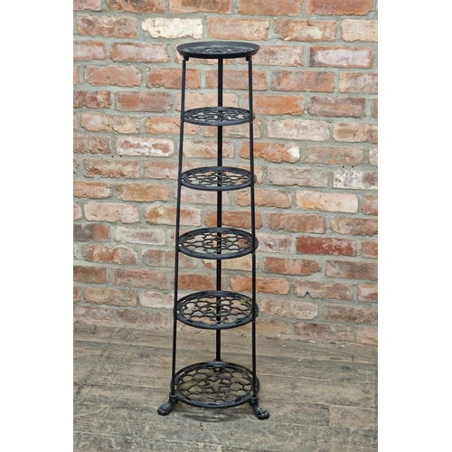 1264 - Vintage cast metal graduated pan stand with pierced detail and paw feet, by Viking, H 122cm x W 39cm