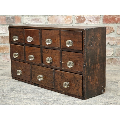 1274 - Vintage bank of eleven Apothecary drawers with glass handles, H 39cm W 71cm x D 21cm