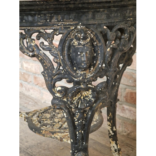 1276 - Victorian cast iron Britannia pub table with marble top, H 76cm x W 80cm