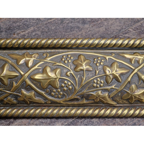 1290 - Good quality Art Nouveau brass country house fire fender with repeating foliate relief, H 12cm x W 1... 