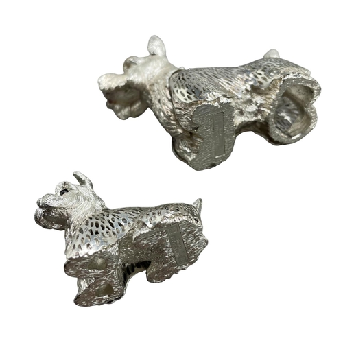 190 - Christofle of France - Two 'Lumiere D'argent' Scottish Terrier dogs, tallest 6cm. (2)