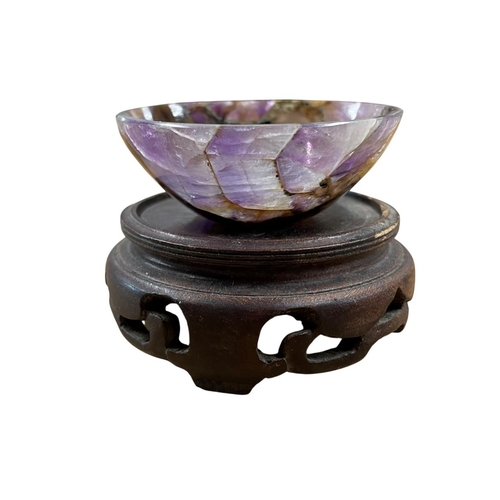 243 - Miniature amethyst bowl Grand Tour souvenir, atop later carved Chinese stand, bowl H 2cm X D 5.5cm