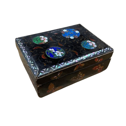 291 - 19th century black lacquered box with butterfly wing circular panels fronted by enamel floral detail... 