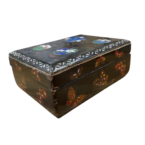 291 - 19th century black lacquered box with butterfly wing circular panels fronted by enamel floral detail... 