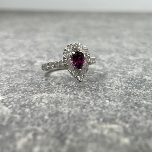 49 - Platinum garnet and diamond cluster ring, pear shaped garnet .45ct, framed with round brilliant cut ... 