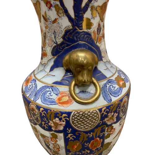 353 - Chinese export Imari palette vase of urn form, with twin gilt masks handles, the vase decorated with... 