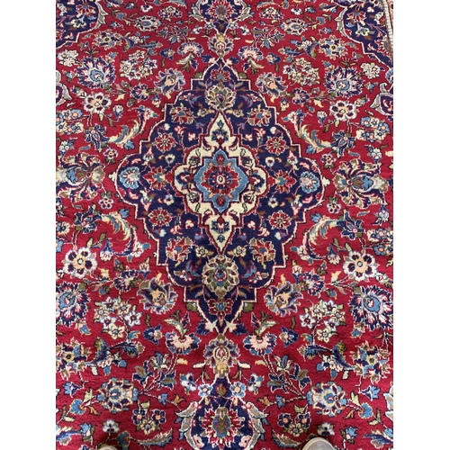 1652 - Exceptionally large Central Persian Kashan carpet, 305cm x 200cm