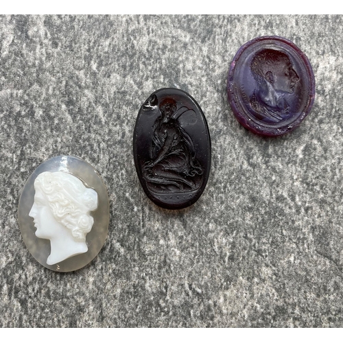 46 - Two signed carved intaglio panels and a later Italian cameo (3)