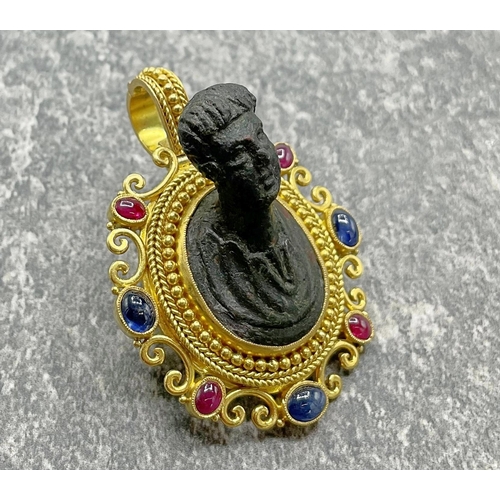 41 - Unusual and rare 22ct Grand Tour pendant, fitted with a Roman bronze bust and framed by ruby and sap... 