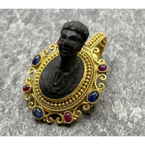 41 - Unusual and rare 22ct Grand Tour pendant, fitted with a Roman bronze bust and framed by ruby and sap... 