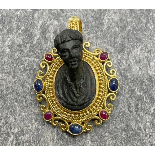 41 - Unusual and rare 22ct Grand Tour pendant, fitted with a Roman bronze bust and framed by ruby and sap... 