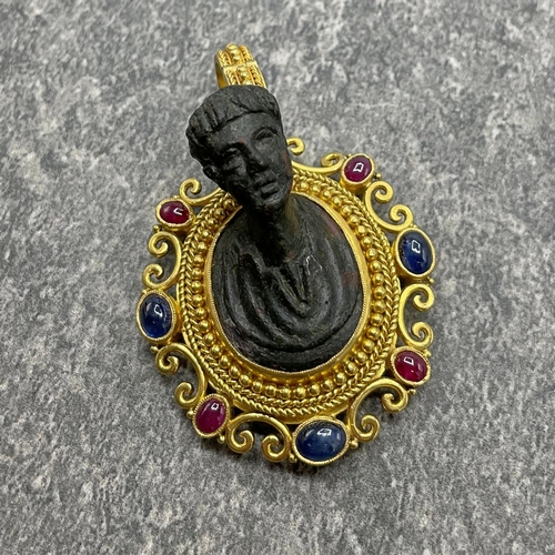 41 - Unusual and rare 22ct Grand Tour pendant, fitted with a Roman bronze bust and framed by ruby and sap... 