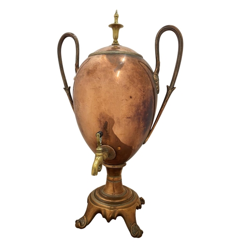 530 - Regency copper and brass samovar, the ovoid body with domed cover with brass bladed finial and two h... 