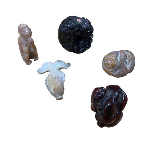 294 - Mixed quantity of hand carved Japanese netsukes - to include a mother of pearl netsuke in the form o... 