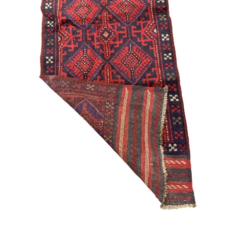 1669 - Meshwani runner with red ground, 239cm x 58cm