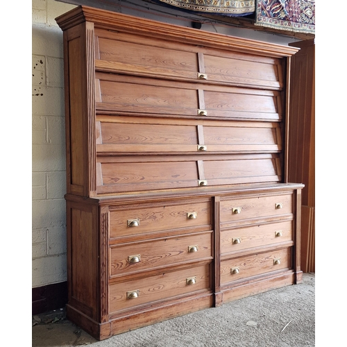 1386 - Good quality 20th century pitch pine two sectional cabinet, the top fitted with four hinged cupboard... 