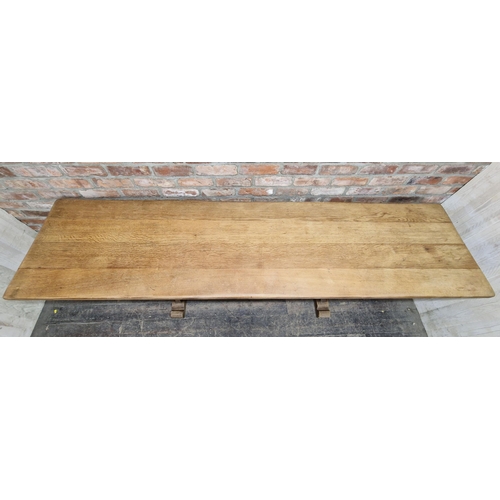 1390 - Rustic oak farmhouse trestle table with shaped ends, H 76cm x W 244cm x D 61cm