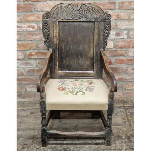 1399 - 17th century carved oak wainscot chair with upholstered seat, H 102cm x W 57cm x D 44cm