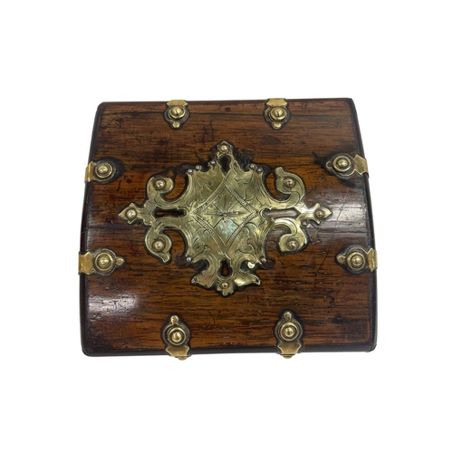 510 - A good 19th Century brass bound domed top rosewood tea caddy, the lid with decorative brass mount an... 