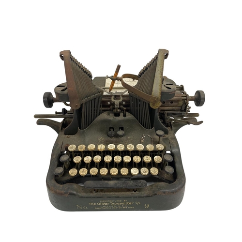 607 - Mixed quantity of antique typewriters to include The Oliver Typewriter Number 9, Olympia Model 8 and... 