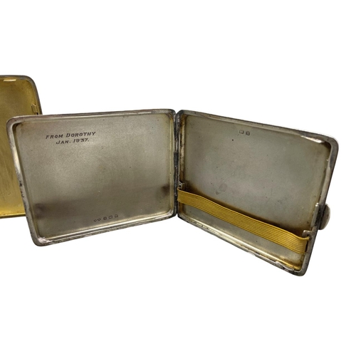 94 - Two engine turned silver cigarette cases, 7.5oz approx