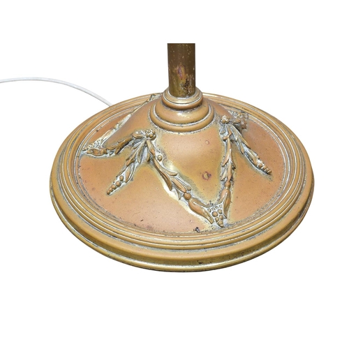 1108 - Victorian brass telescopic standard lamp with shade and fruiting vine in relief to base, H 180cm