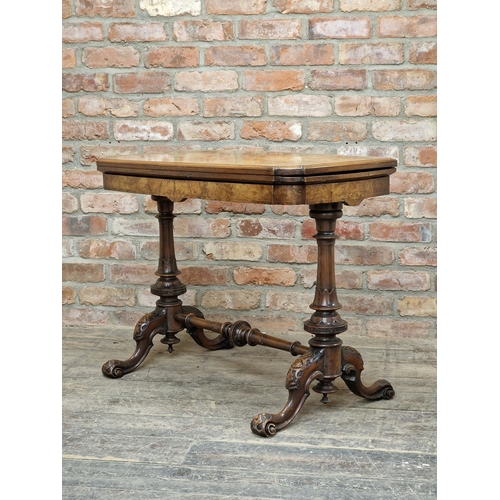 1403 - Good quality Victorian burr walnut fold over top card table with carved detail, H 72cm x W 93cm