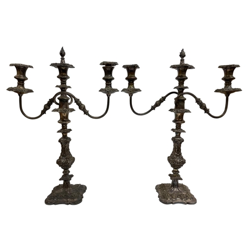 157 - Large pair of Victorian silver plated candelabra with intricate cast scrolling detail, and a further... 