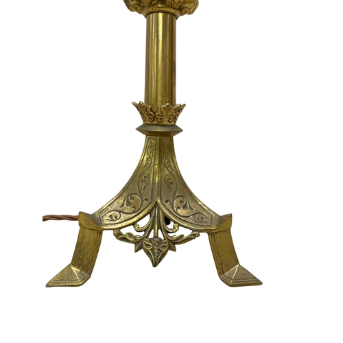 1100 - Brass Gothic style pricket table lamp, the triform base with scroll detail, H 63cm