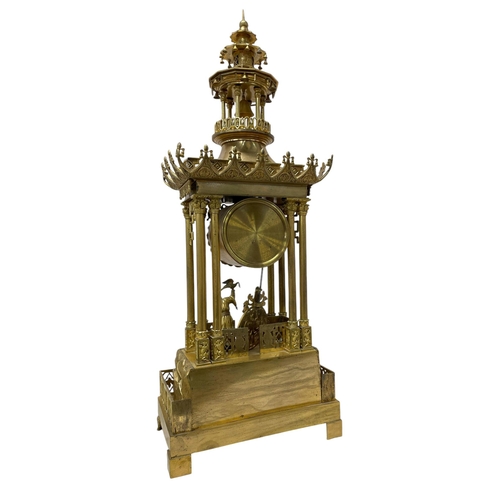 215 - After Theodore Leroy (1788-1839) - A Chinese style gilt metal portico clock in the form of a pagoda,... 