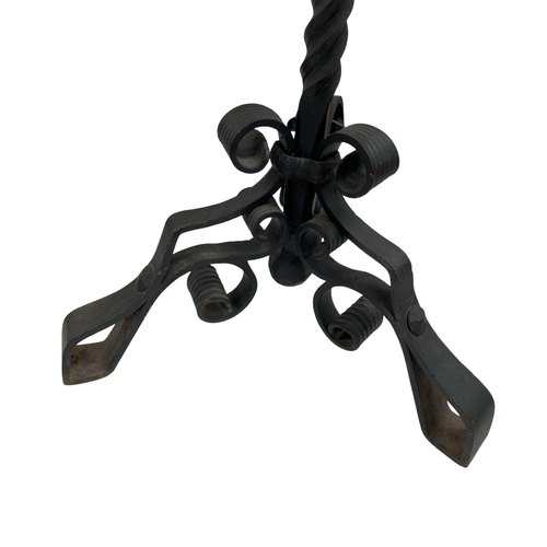 531 - Heavy wrought iron tri-footed menu stand, having ornate scrolled feet and twisted stem design with i... 