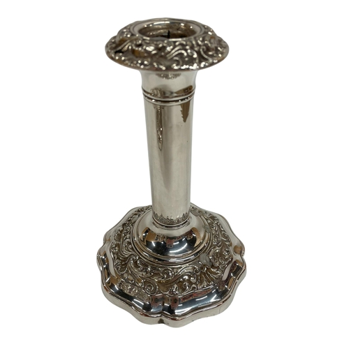 141 - Set of six silver plated Regency candlesticks, having ornate scrolled decoration to base and fluted ... 