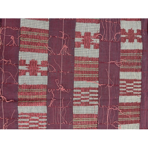 323 - Large African tribal Ashanti Kente cloth, having narrow treadle loom strips being joined and pick th... 