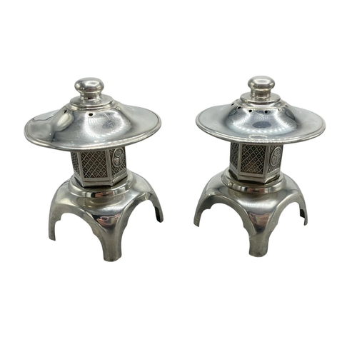 107 - Novelty pair of Sterling silver pagoda salt and pepper, 8cm high, 3oz approx