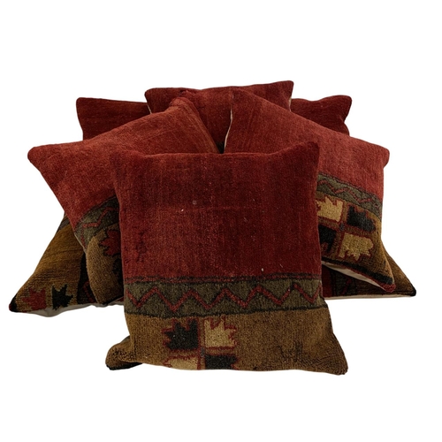 1637 - Collection of hand crafted rug cushions, the covers being cut from an antique Persian rug, 40cm x 35... 