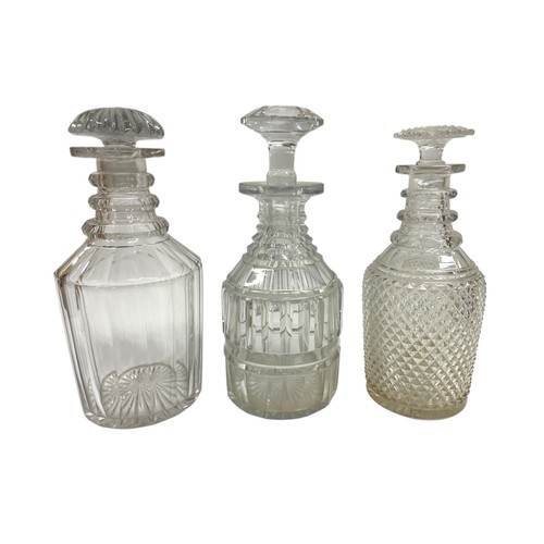 396 - Antique drinks service to include a quantity of crystal cut glass decanters with stoppers, a large c... 